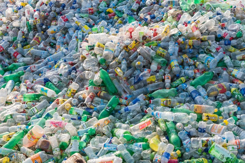 Photo of plastic bottle waste in a large heap