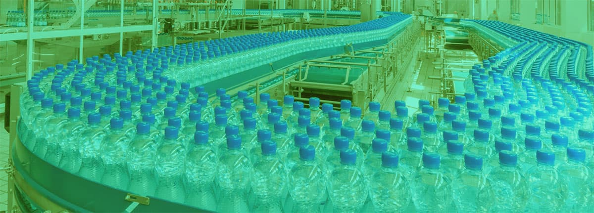 Photo of plastic bottles being produced in a factory