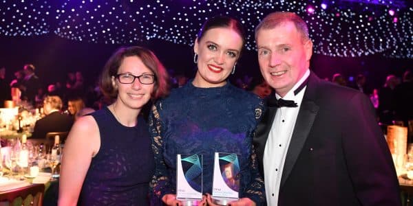 Photo of Polytag staff at an awards ceremony.